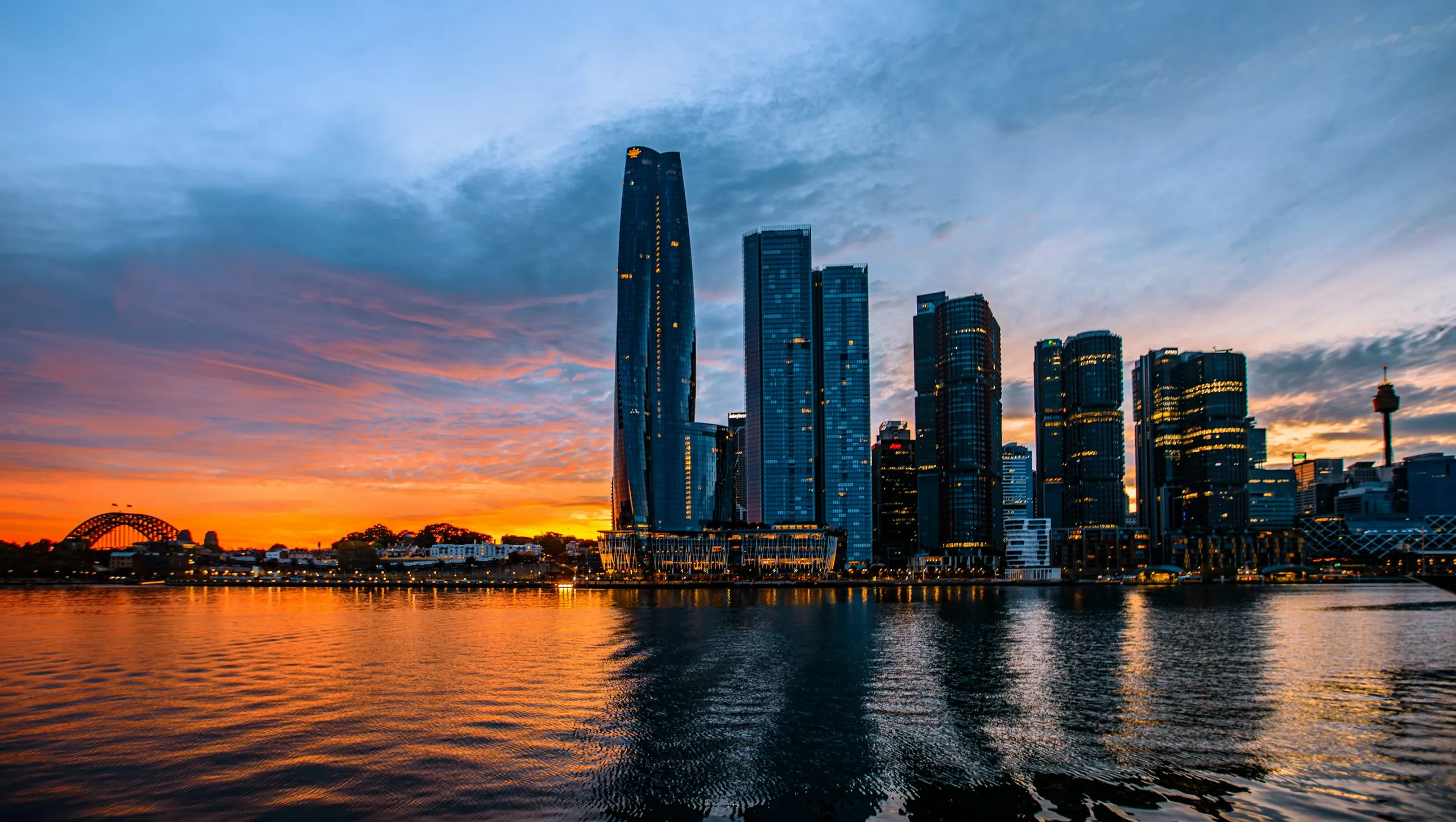 Sydney's Barangaroo towers and harbour at dusk, home of Jameson Law's Sydney CBD office